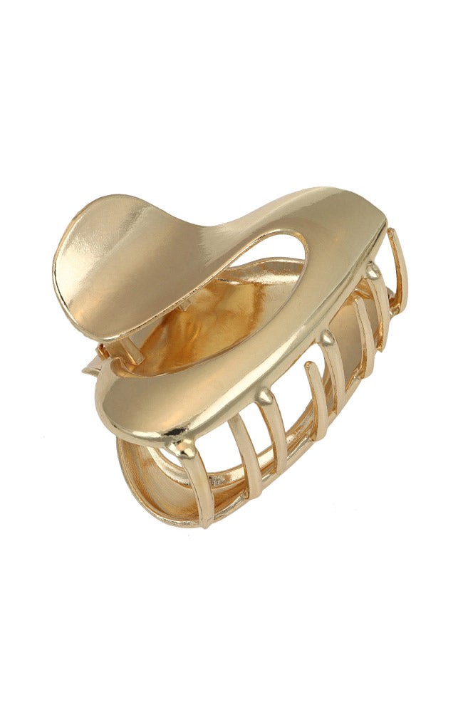 Gold hair clip, modern cutout design. L. Erickson hair claw for medium to thick hair